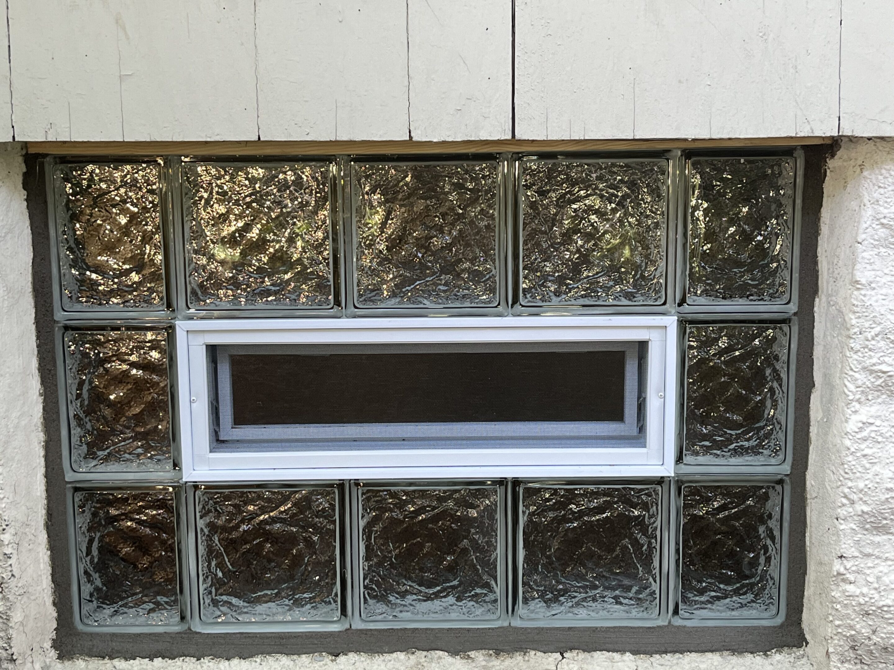 Installed basement window in residential home